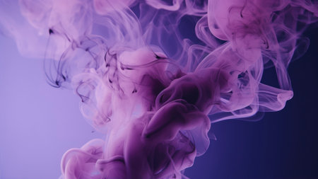 Purple ink in water on a blue background. abstract background.の素材