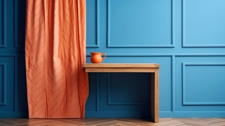 Cup of coffee and orange curtain on wooden table in blue roomの素材