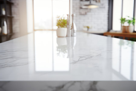 Closeup of white marble table in modern kitchen. Blurred backgroundの素材