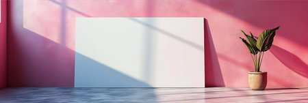 Minimalist interior with blank poster on pink wallの素材