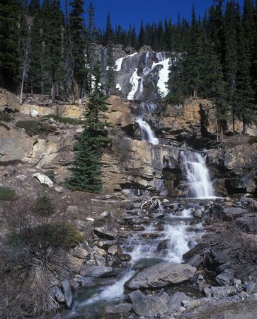 Mountain waterfall in national park of canadaの写真素材