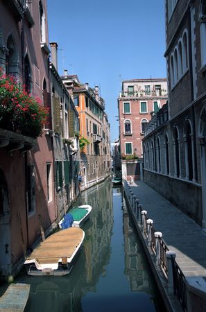 Quiet back street canal scene of Cannaregio Venice Italy の写真素材