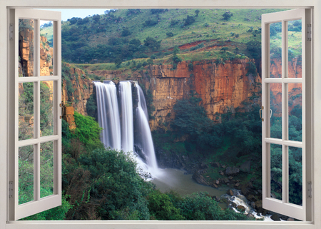 Elands River Falls in Mpumalanga state of South Africa.These falls have been declared a national monument. At this waterfall the water of the Elands River gushes over a 228-meter cliff in three separate streams, splashing into a clear, deep poolの写真素材