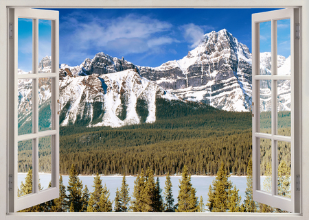 Panoramic view to snow peaks of Canadian Rocky Mountains in summerの写真素材