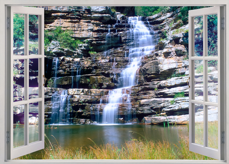Open window view to waterfallの写真素材