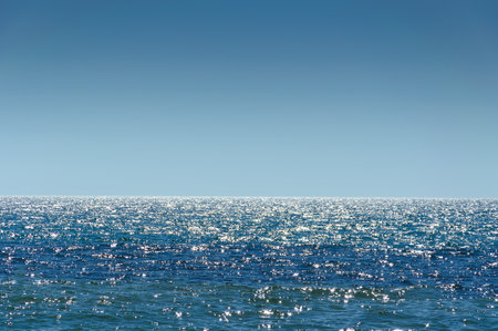 landscape view of the open blue sea blue sky. sparkling reflections of waterの写真素材