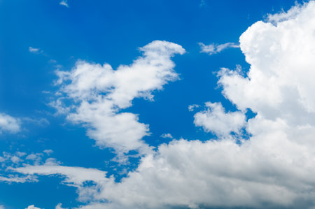 Gray white clouds. Clouds of thunderclouds on a blue sky. Summer day.の写真素材