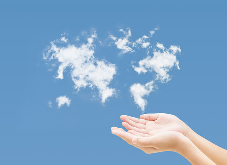 Hand and blue sky clouds mapの写真素材