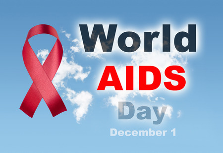Red ribbon with sky world clouds map world aids day 1 december text