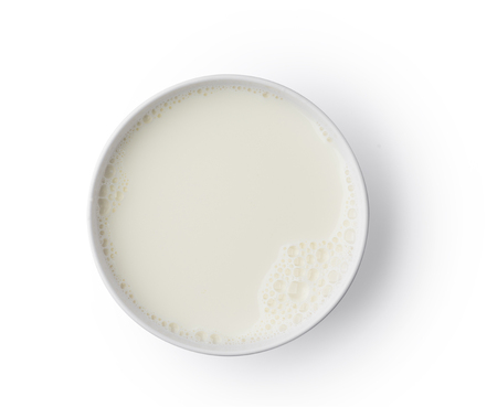 Cup with milk bubble foam on top view isolated texture on white background object designの写真素材