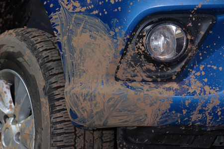 Car off road dirty front wheel splash muddyの写真素材