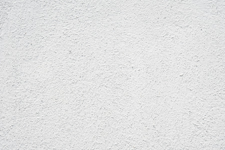 Close up clean white wall cement texture backdrop background hi resolutionの写真素材