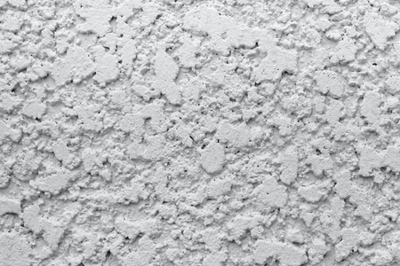 Gray rough mortar wall cement lumpy texture backgroundの写真素材