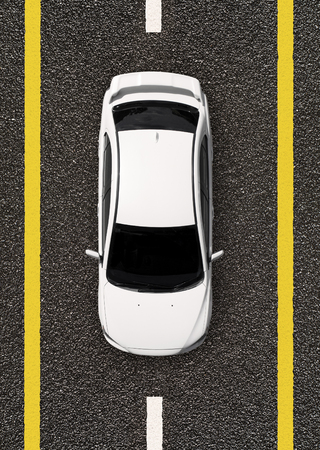 White car on road aerial viewの写真素材