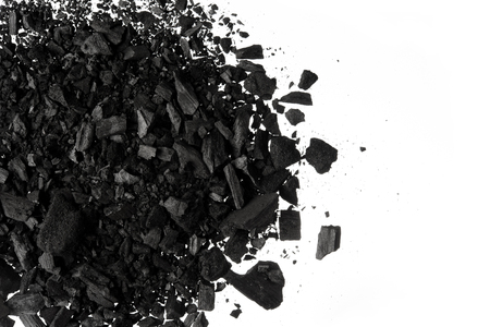 Pile of Carbon charcoal  dust on white background