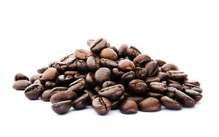 Heap of coffee beans on white backgroundの写真素材