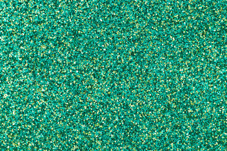 Green and gold glitter texture holiday abstract backgroundの写真素材