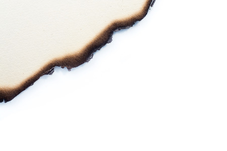 Burn old brown paper in corner texture backgroundの写真素材