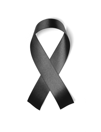 Black ribbon isolated on white background の写真素材