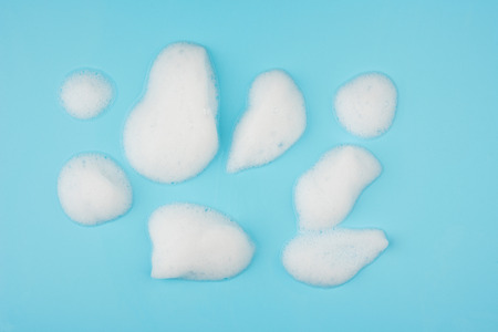 Group of foam bubble on blue background on top view object beatuy health care concept designの写真素材