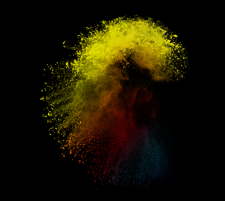 Colorful powder or dust explosion isolated on black background  freeze stop motion art abstract photo object designの写真素材