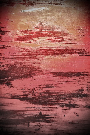 pink metal plate with horizontal scratchesの写真素材