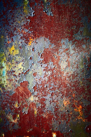 Red color of a rust with a shabby colourful covering