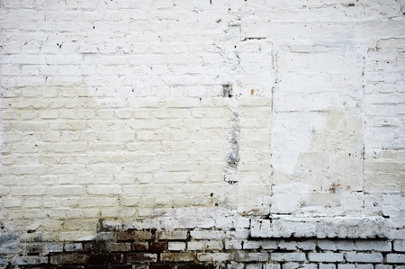 Background in style grunge. The immured window on a brick wallの写真素材