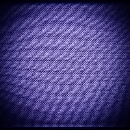Background a texture from a polyester synthetic fabric of blue colorの写真素材