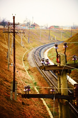 Old electrical communications against the railway. In style vintageの写真素材