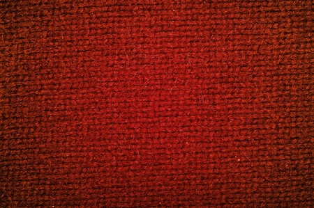 Background a texture a knitted woolen fabric of dark green colorの写真素材