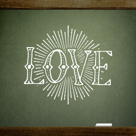 Valentine's background with the words of love, handwritten on blackboard with chalkのイラスト素材