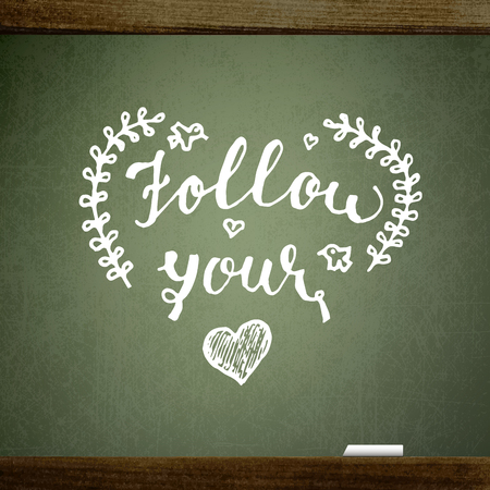 Valentine's background with the words of Follow Your Heart, handwritten on blackboard with chalkのイラスト素材