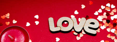 ring, word love, candles and confettiの写真素材