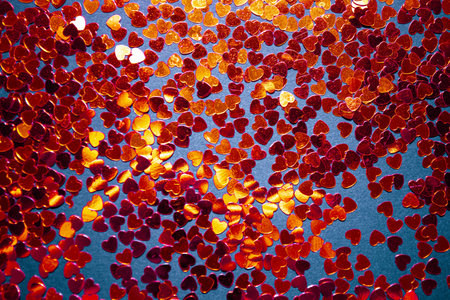 red confetti on a red background