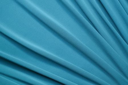 Smooth elegant blue satin texture abstract background. Luxurious background design.