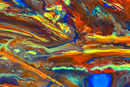 Abstract background of colorful creative acrylic painting. Oil move to water. Blue, orange, red and...