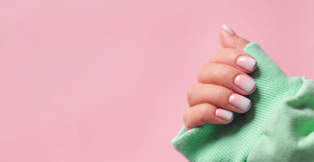 Gradient manicure and Hands Spa. Banner with copy space for text. Beautiful Woman hand closeup....