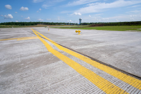 Yellow markings on empty runwayの写真素材