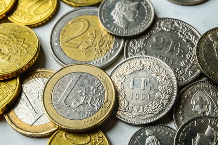 Euro and Swiss Franc coinsの写真素材