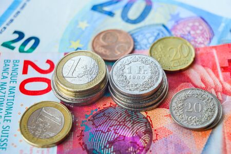 Euro and Swiss Francs coins and banknotesの写真素材