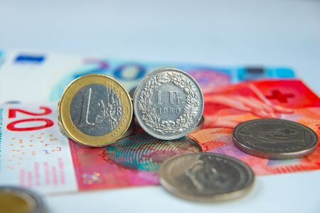 Euro and Swiss Francs coins and banknotesの写真素材