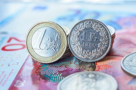 Euro and Swiss Francs coins and banknotesの写真素材