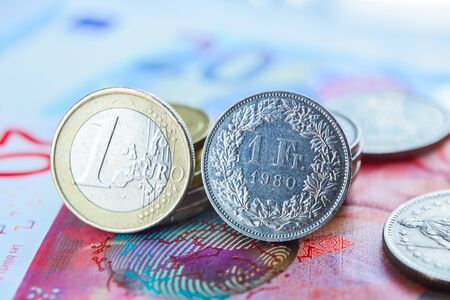 Euro and Swiss Francs coins and banknotesの写真素材