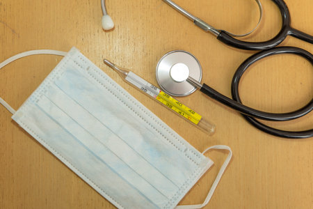 Mask, thermometer and stethoscope