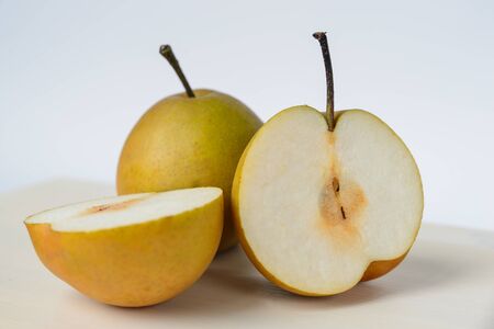 Cut nashi on a cutting board, Pyrus Pyrifoliaの写真素材