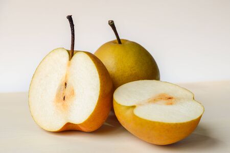 Cut nashi on a cutting board, Pyrus Pyrifoliaの写真素材