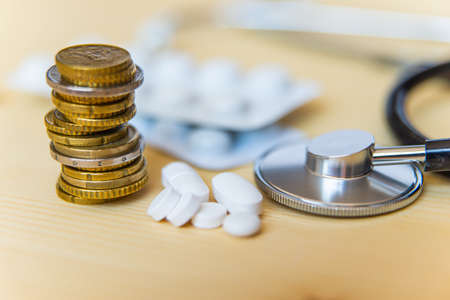Medicine, stethoscope and money; health expensesの写真素材