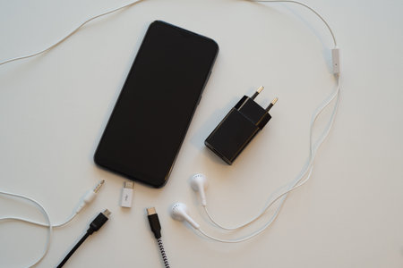 Smartphone, earphones, power supplies, USB connections. Smartphone connections and accessories.