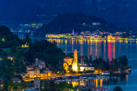 Panorama on Lake Como, with the villages of Tremezzina, Bellagio and the mountains that overlook them, photographed in the evening.の写真素材